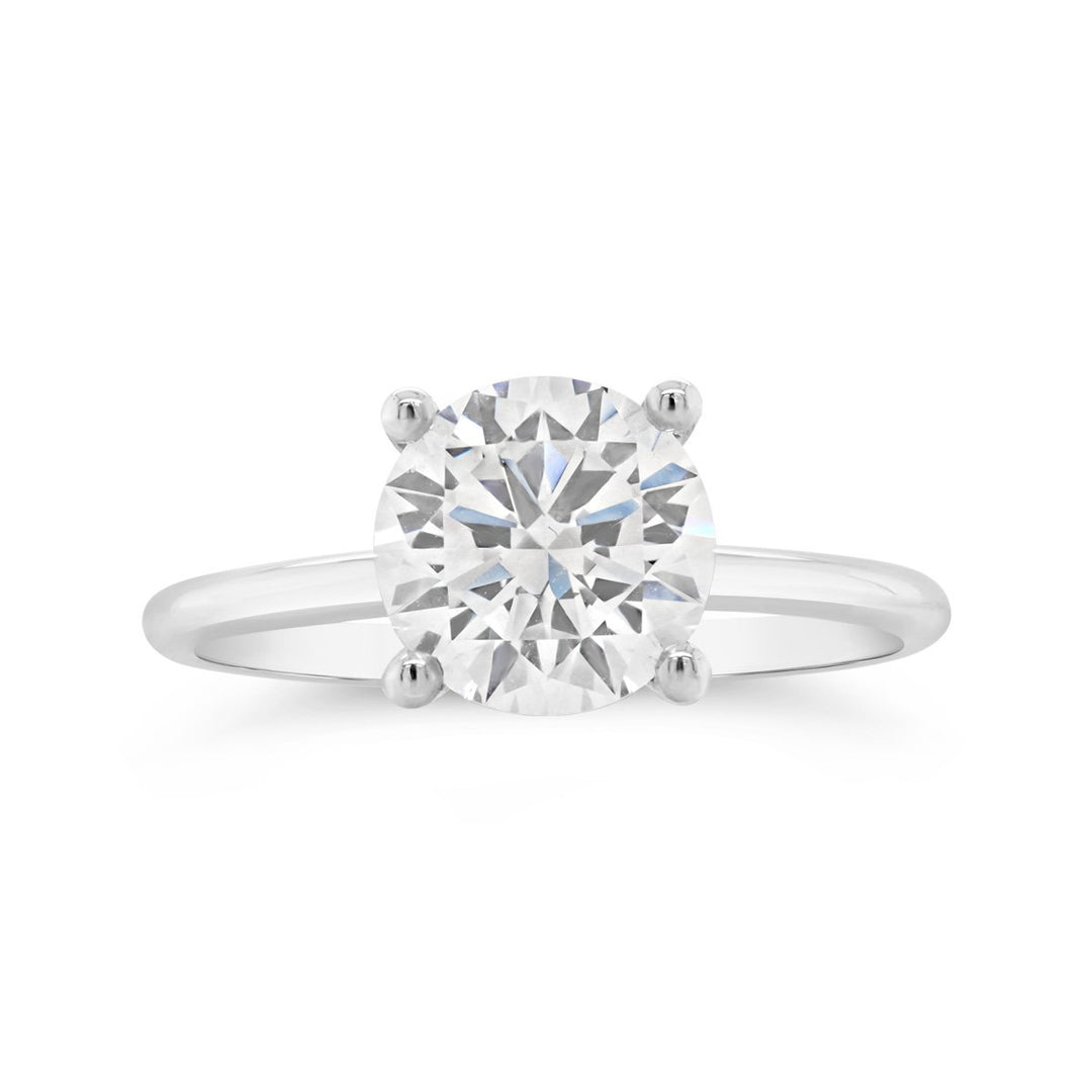 Solitaire Engagement Ring with Peek-a-boo Accent Stones