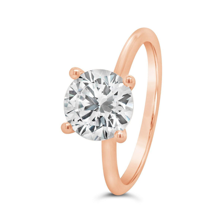 Solitaire Engagement Ring with Peek-a-boo Accent Stones