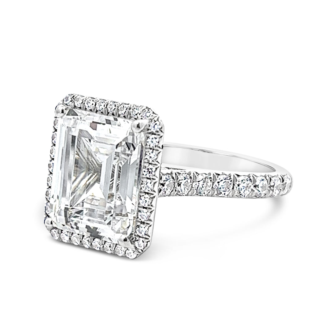 Dazzling Halo Engagement Ring Adorned with Pave Diamonds