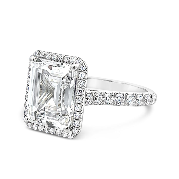 Dazzling Halo Engagement Ring Adorned with Pave Diamonds
