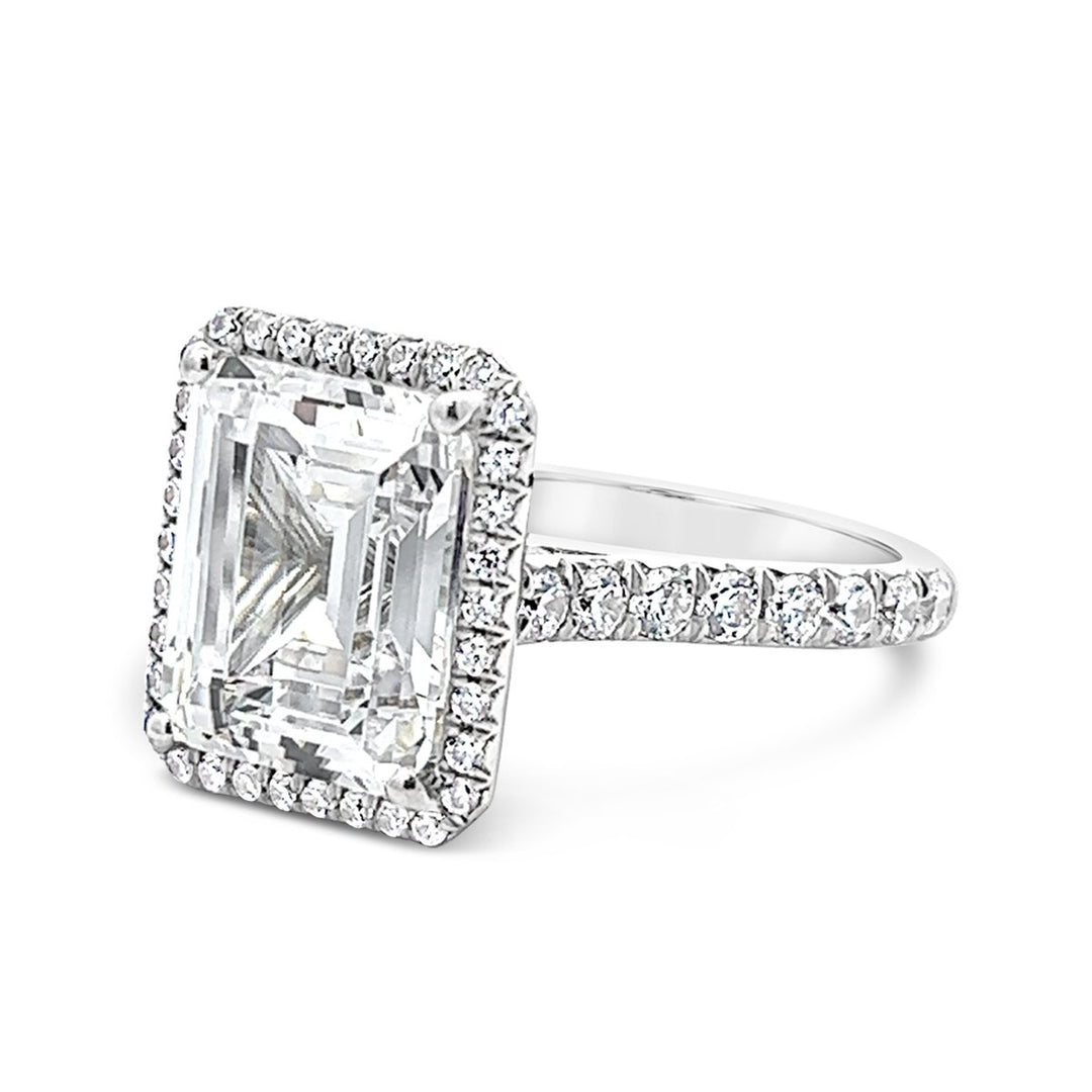 Dazzling Halo Engagement Ring Adorned with Pave Diamonds