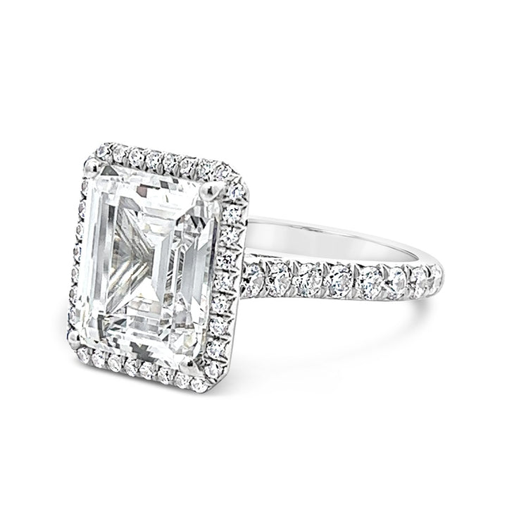 Dazzling Halo Engagement Ring Adorned with Pave Diamonds