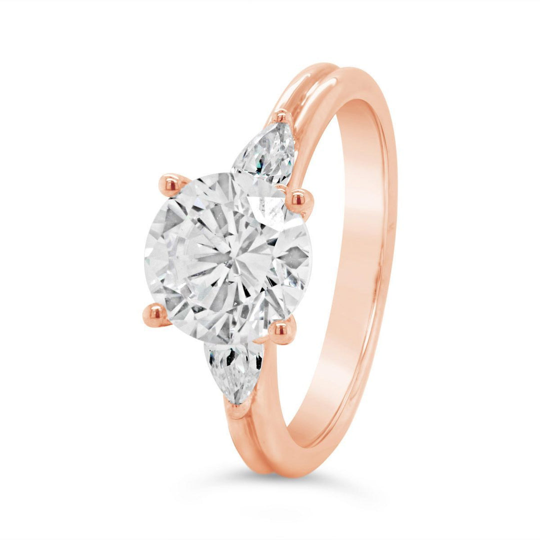 Three Stone Diamond Engagement Ring with Pear Shape Side Diamonds - The Diamond Guys