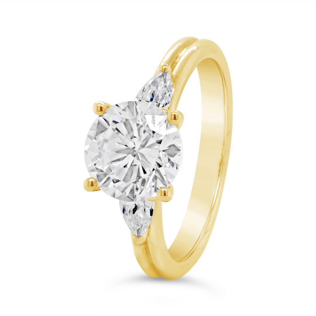 Three Stone Diamond Engagement Ring with Pear Shape Side Diamonds