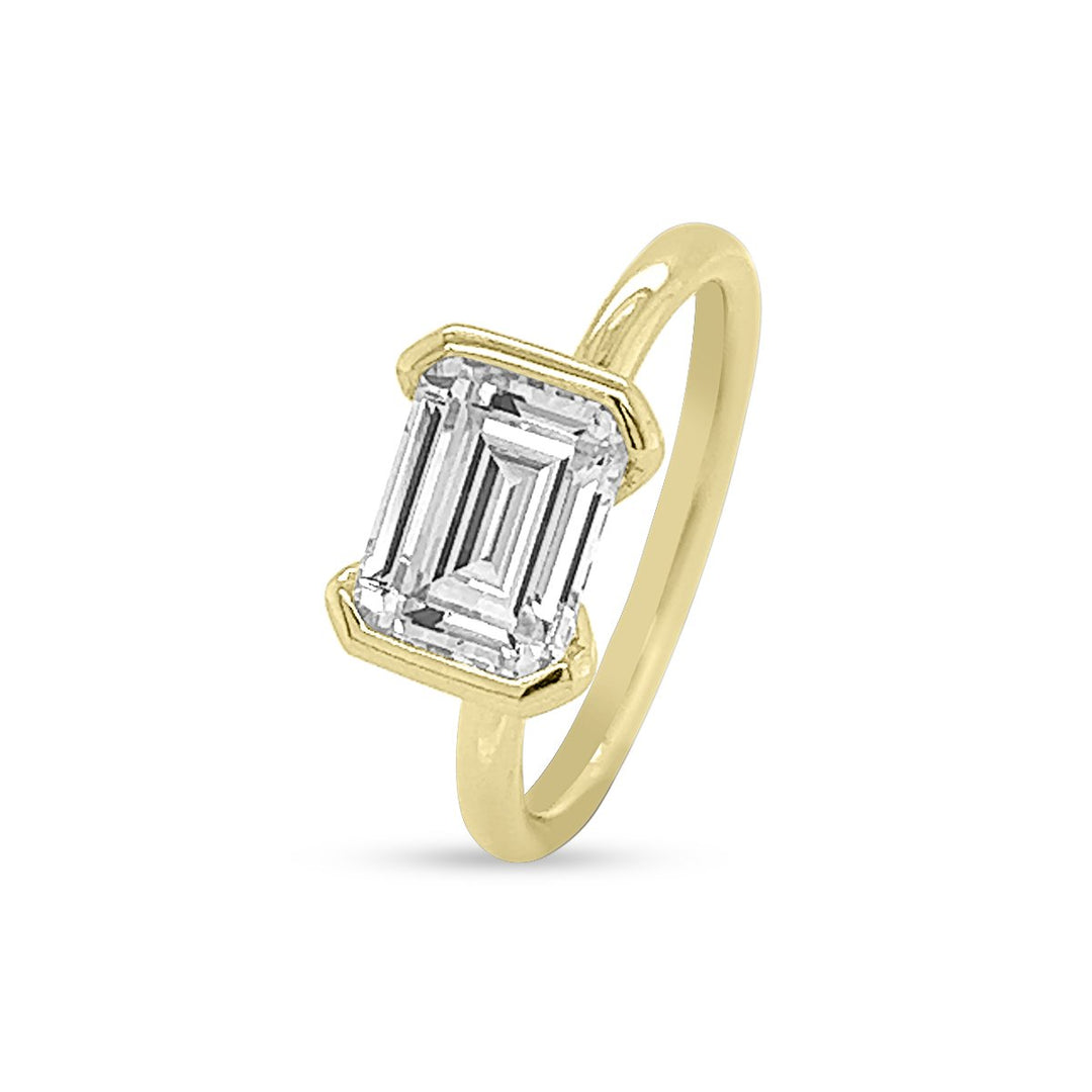 Unique Half-Bezel Emerald Diamond Engagement Ring - The Diamond Guys