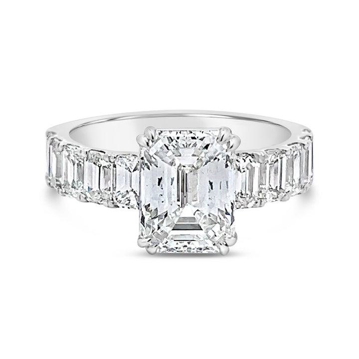 Modern Diamond Engagement Ring with Emerald side stones - The Diamond Guys