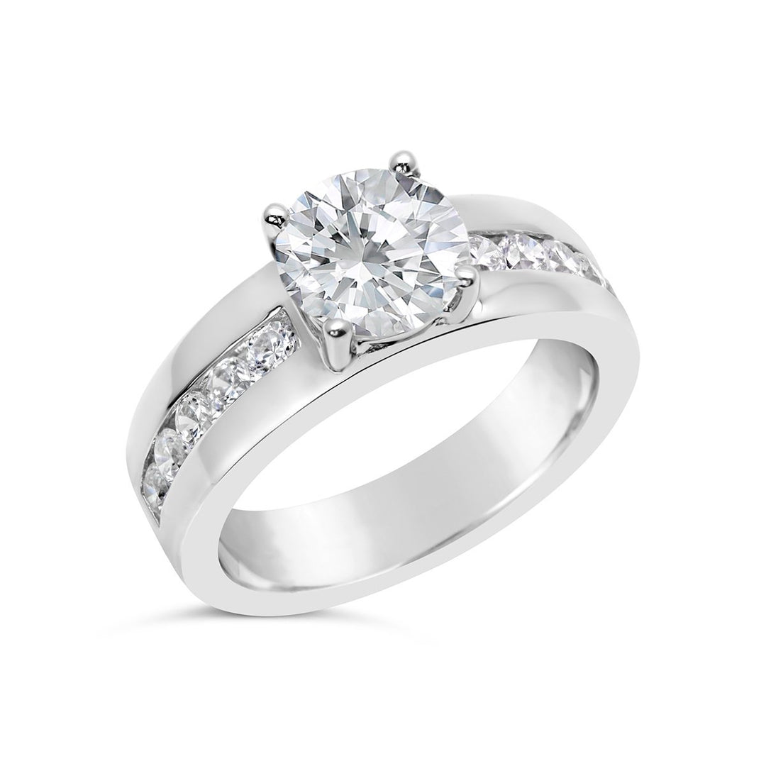 Engagement Ring with Wide Channel Set Band and Round Center - The Diamond Guys