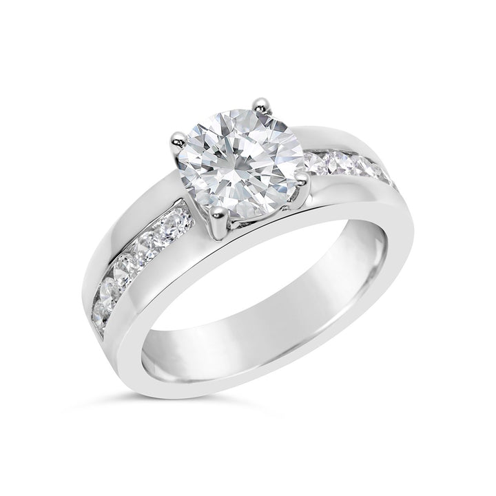 Engagement Ring with Wide Channel Set Band and Round Center - The Diamond Guys