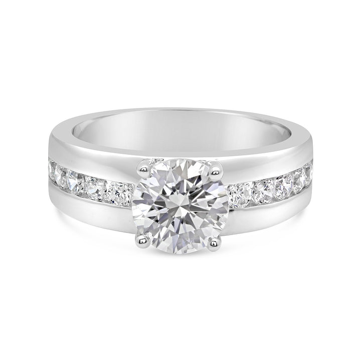 Engagement Ring with Wide Channel Set Band and Round Center - The Diamond Guys